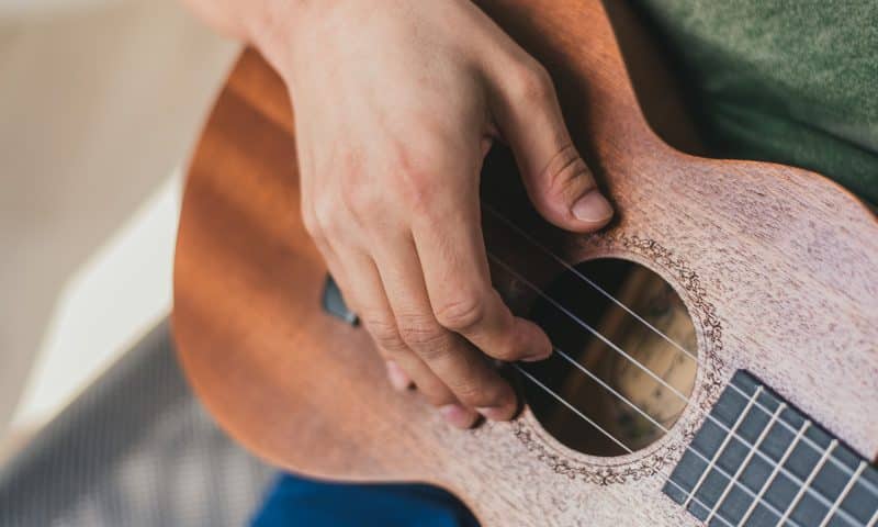 https://www.squamishacademyofmusic.com/wp-content/uploads/2022/07/Adult-Ukulele-2.jpeg