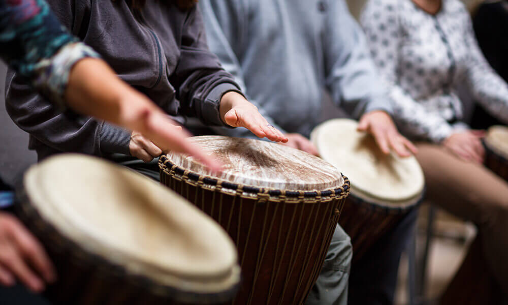 https://www.squamishacademyofmusic.com/wp-content/uploads/2022/11/hand-drum-senior.jpeg