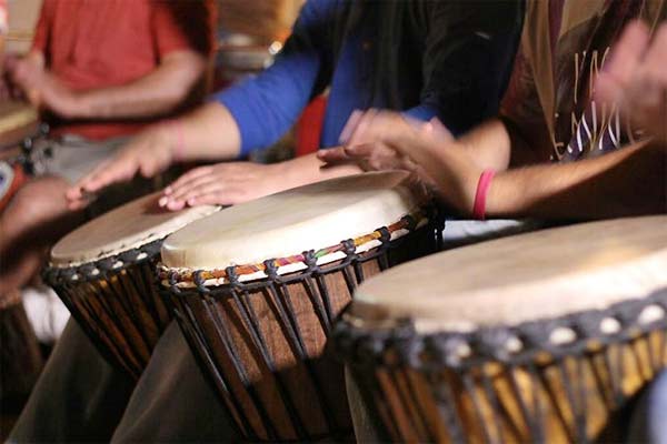 https://www.squamishacademyofmusic.com/wp-content/uploads/2022/11/hand-drum-youth.jpeg