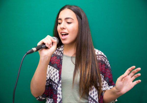 Voice teacher working with a student during a private singing lesson in Squamish